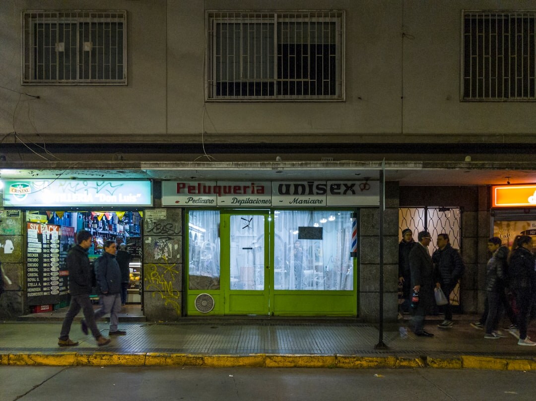 Independent bookstore interior with wooden shelves in Santiago