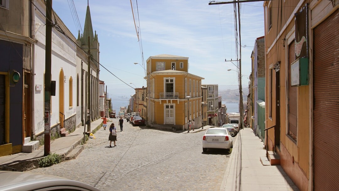 Weathered facade of a historic building in Valparaíso with corrugated metal