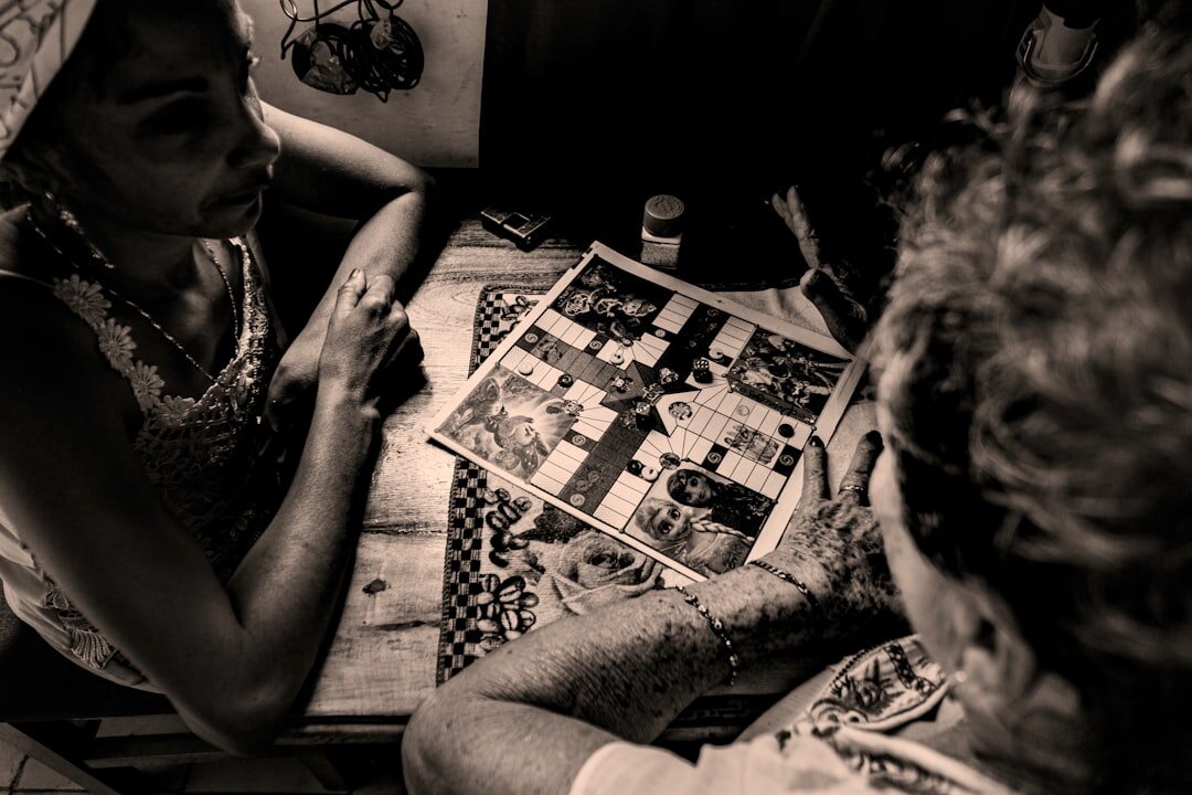Editorial team reviewing photographs on a light table