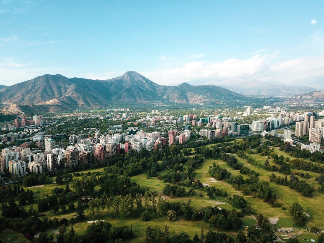 Wide view of the Andes mountains bordering a Chilean city